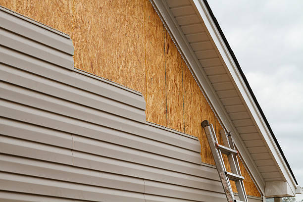 Professional Storm Damage Siding Repair technician working in New Millport, PA